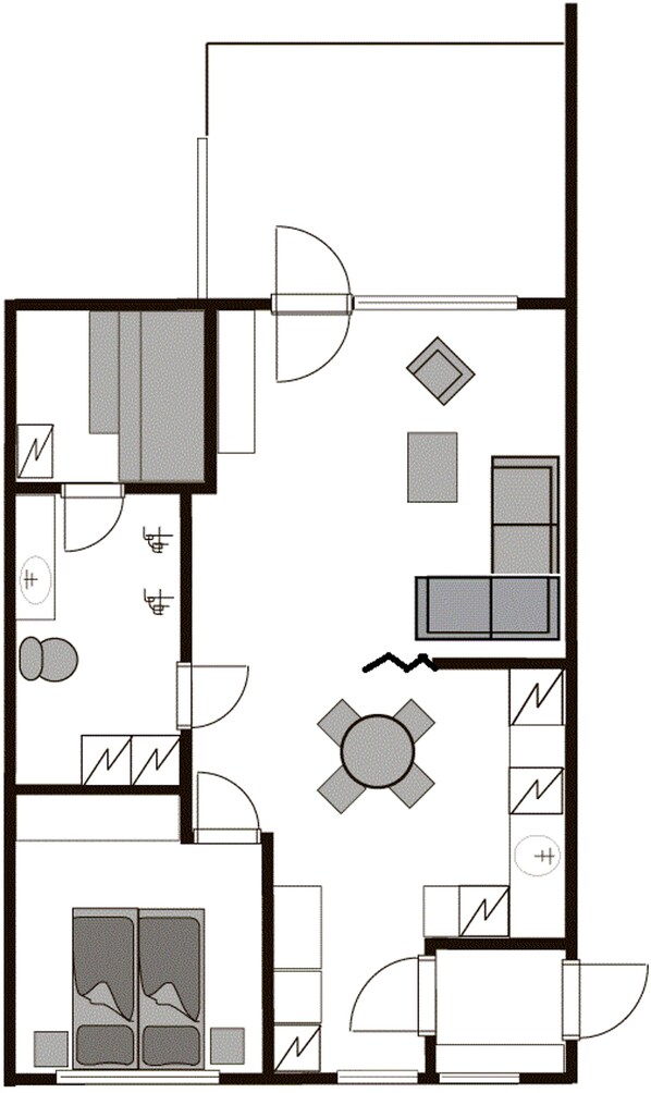Plano de planta que muestra una cocina, comedor y dos dormitorios.