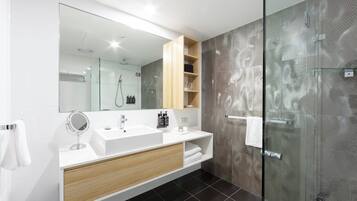 Shower, rainfall showerhead, designer toiletries, hair dryer