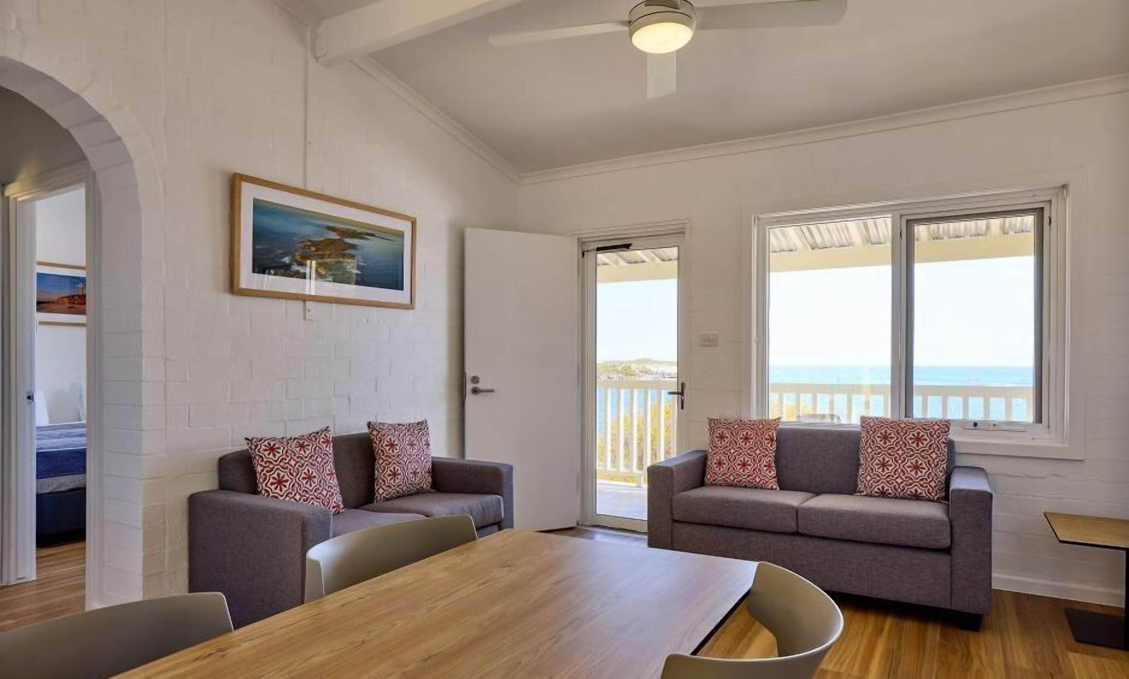 Geordie Bay Premium View Two Bedroom | Living area | TV