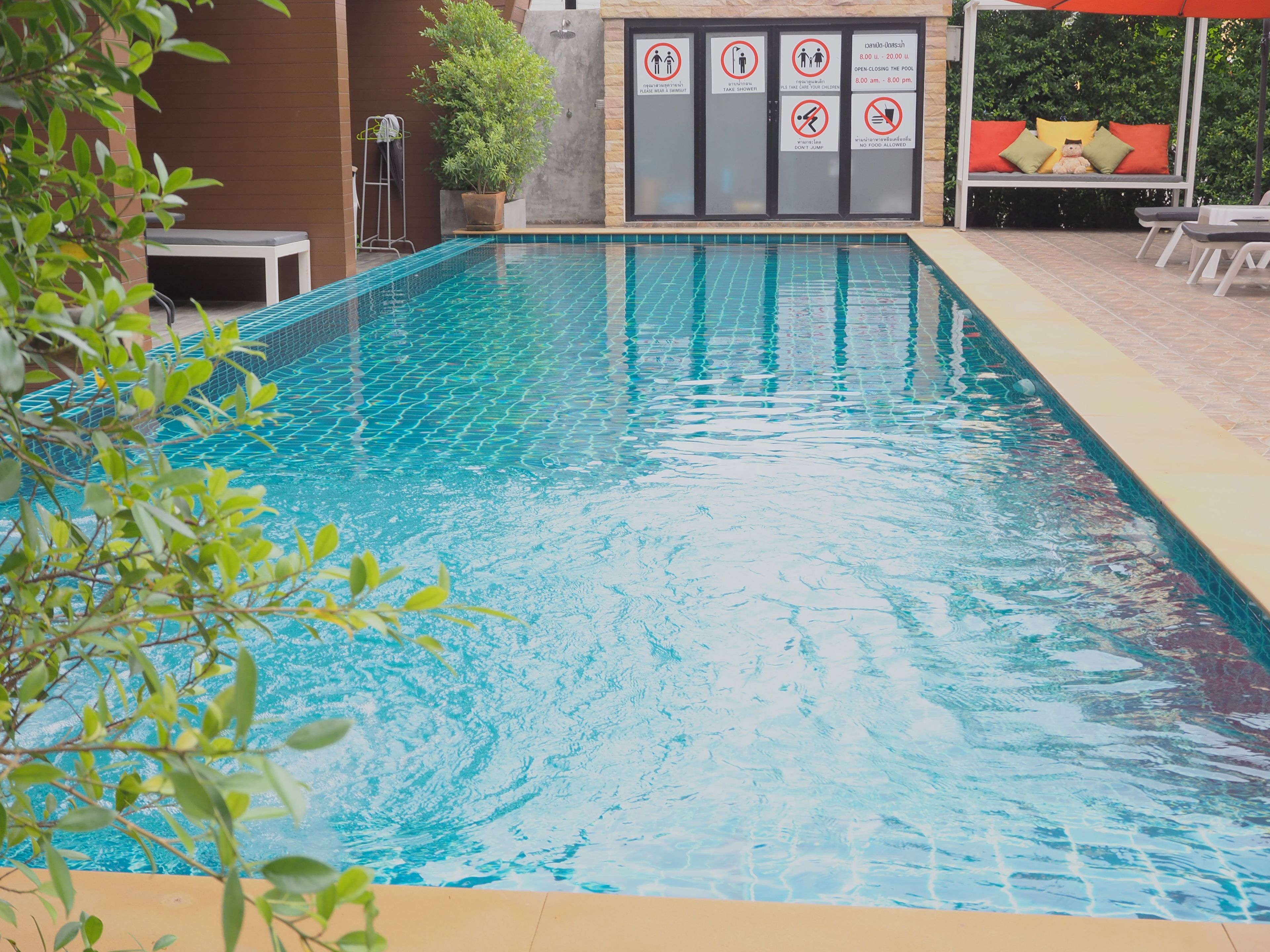 outdoor pool, pool umbrellas, pool loungers