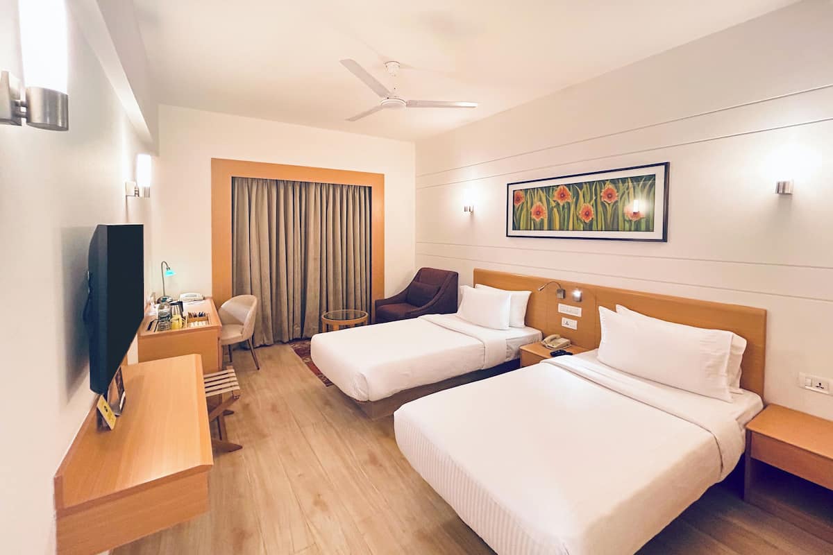 1 makuuhuone, ylelliset vuodevaatteet, minibaari, tallelokero huoneessa