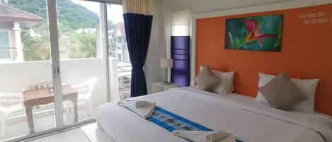 Deluxe Room | 1 bedroom, minibar, in-room safe, individually decorated