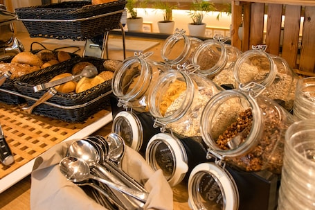 Breakfast, lunch, dinner served; local cuisine, alfresco dining