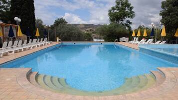 2 outdoor pools, open 9:00 AM to 7:00 PM, pool umbrellas, sun loungers