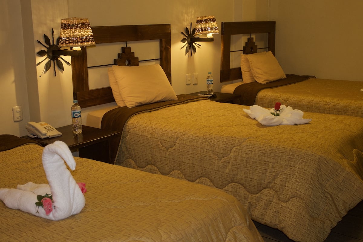 Chambre Triple | Rideaux occultants, Wi-Fi gratuit