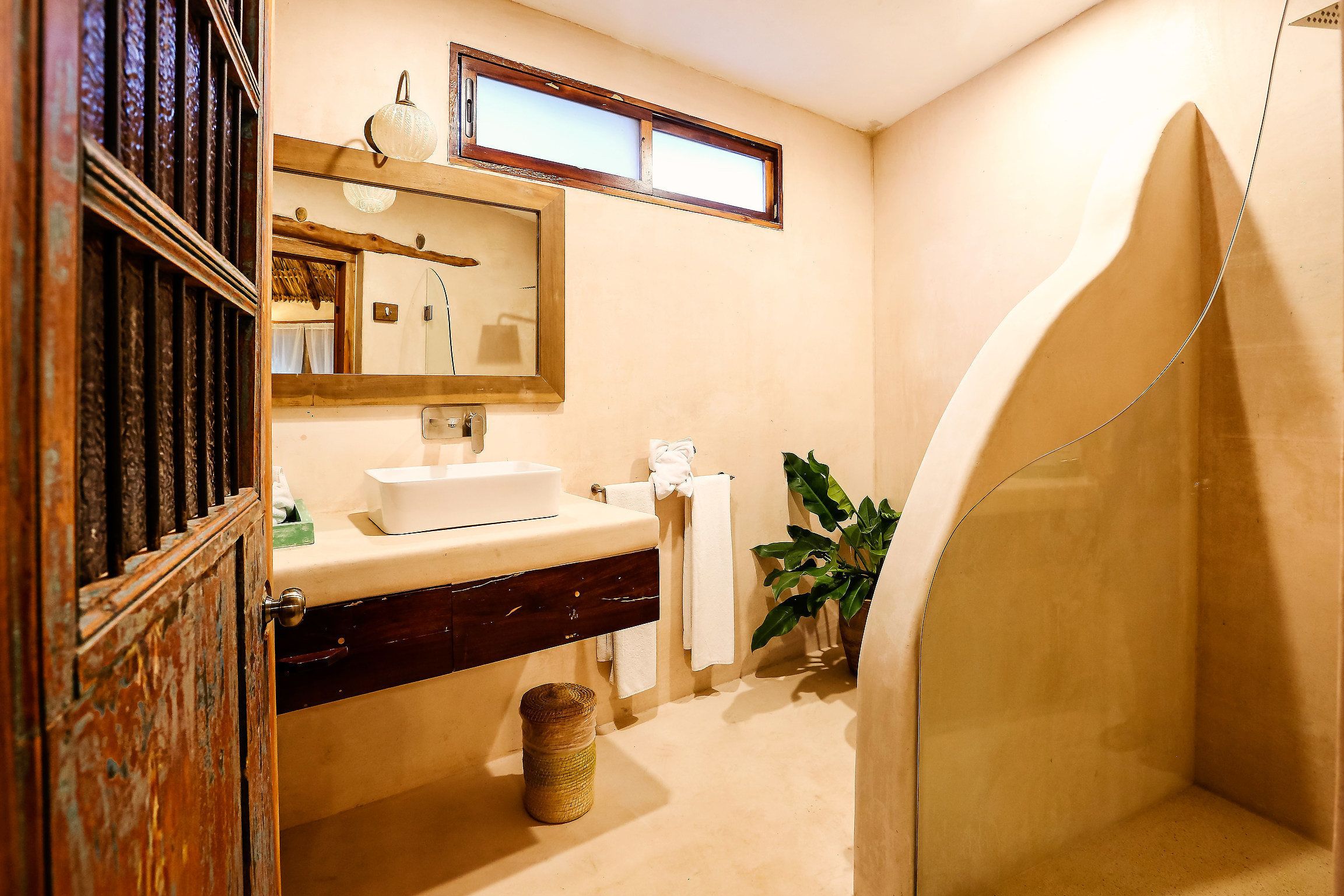 shower, designer toiletries, hair dryer, towels