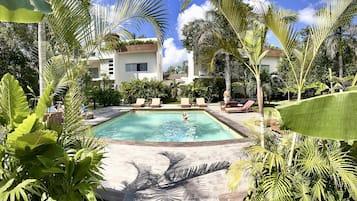 Outdoor pool, open 9:00 AM to 10:00 PM, sun loungers