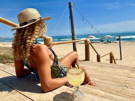 On the beach, sun loungers, beach towels, beach massages