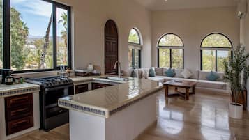 Luxury Suite | Living area | Flat-screen TV, DVD player