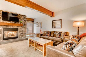 40-inch flat-screen TV with cable channels, TV, fireplace - Sawmill Creek Condos by Ski Country Resorts (Breckenridge)