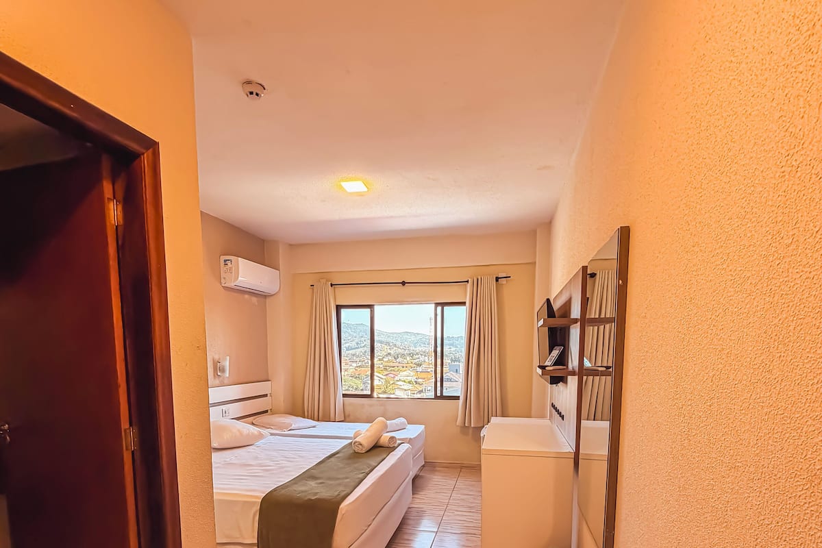 Deluxe Quadruple Room | Minibar, desk, blackout drapes, WiFi (free)