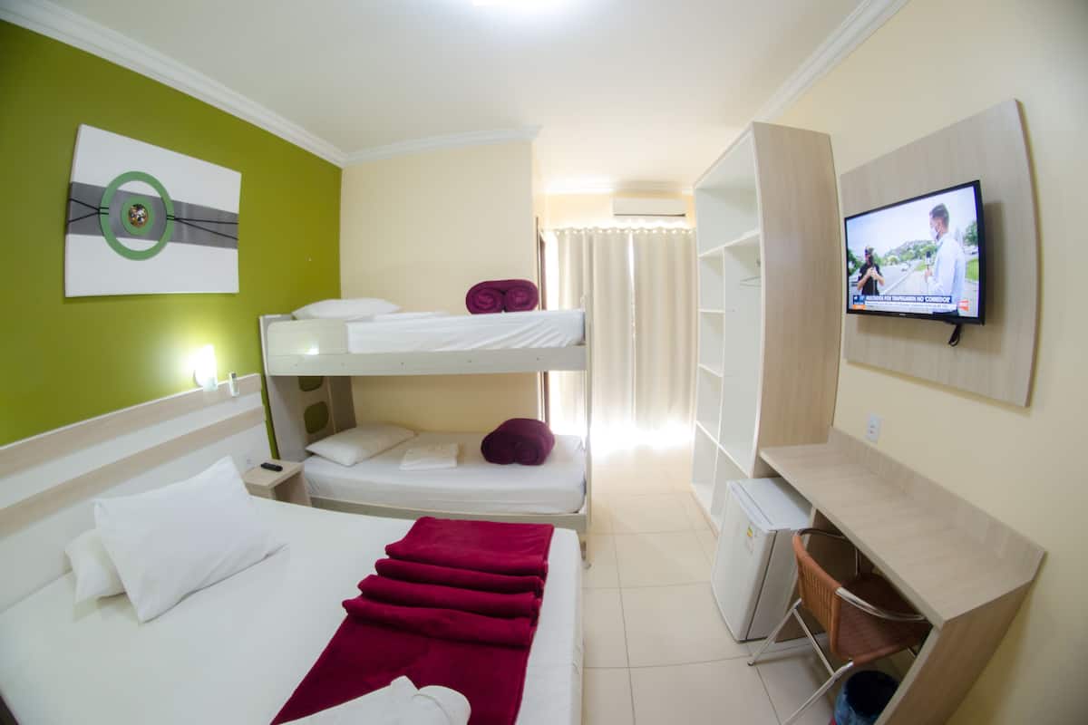 Quadruple Room, Pool View | Minibar, desk, blackout drapes, WiFi (free)