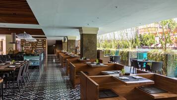 Breakfast, lunch, dinner served; Indonesian cuisine, pool views