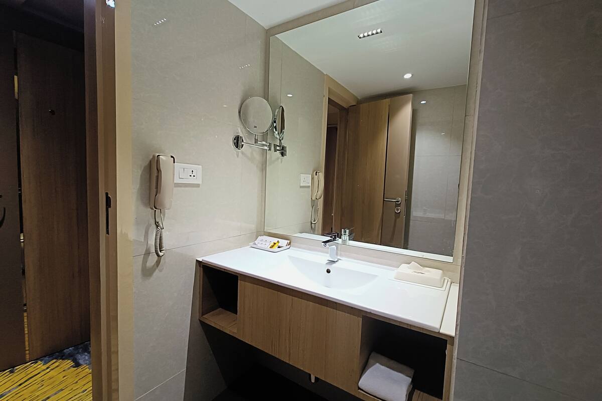 suite | bathroom | shower, slippers, towels