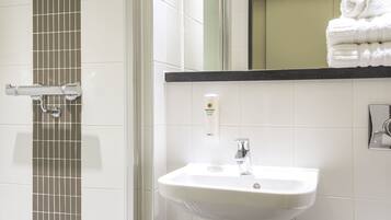 Shower, free toiletries, hair dryer, towels