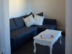 Suite estándar, 1 cama King size, baño en la habitación | Sala de estar | Televisión 