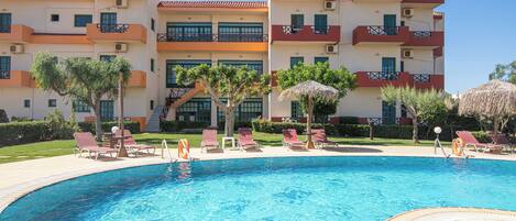 Seasonal outdoor pool, pool umbrellas, pool loungers