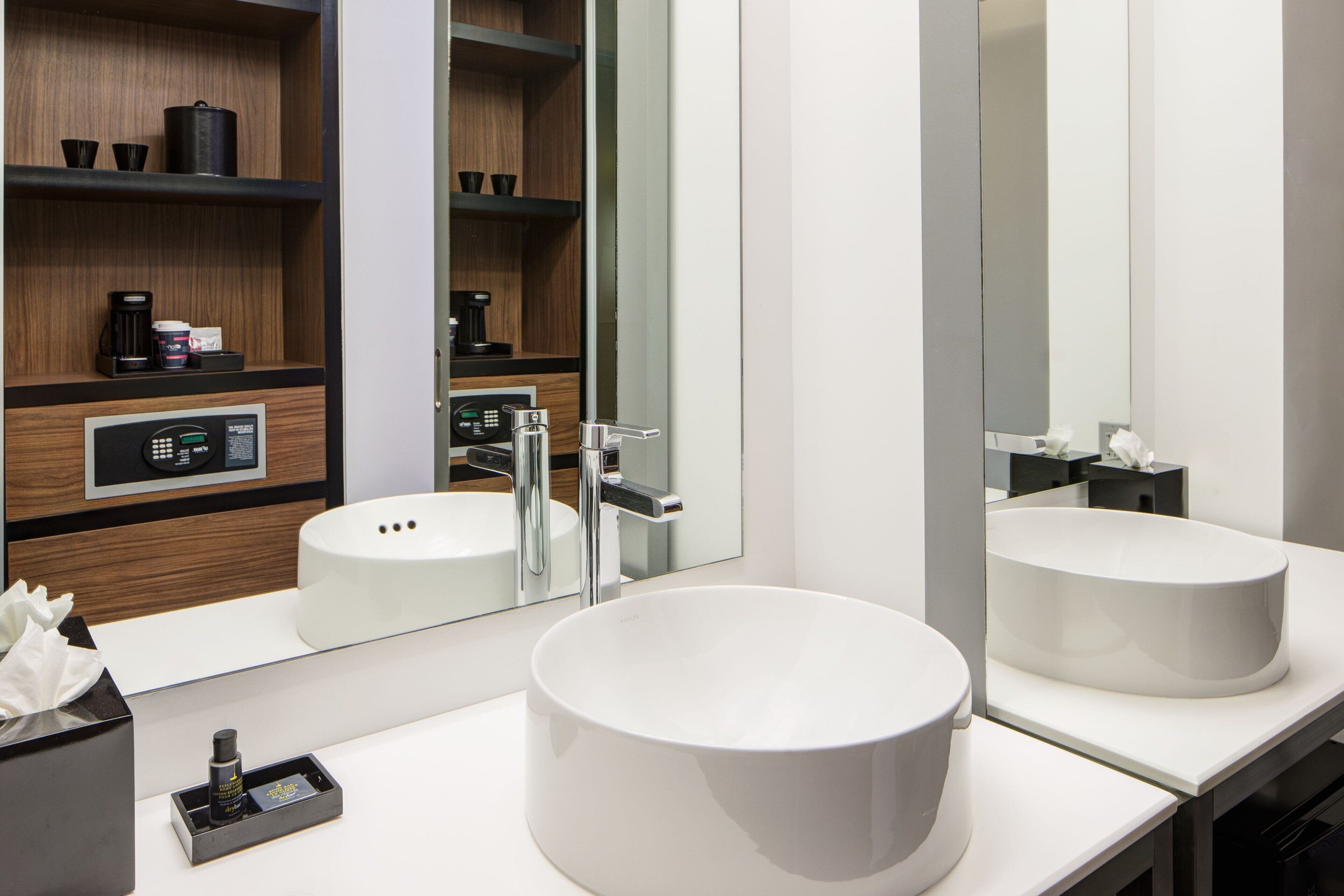 shower, designer toiletries, hair dryer, towels