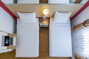 客房内保险箱、办公桌、免费 WiFi、床单