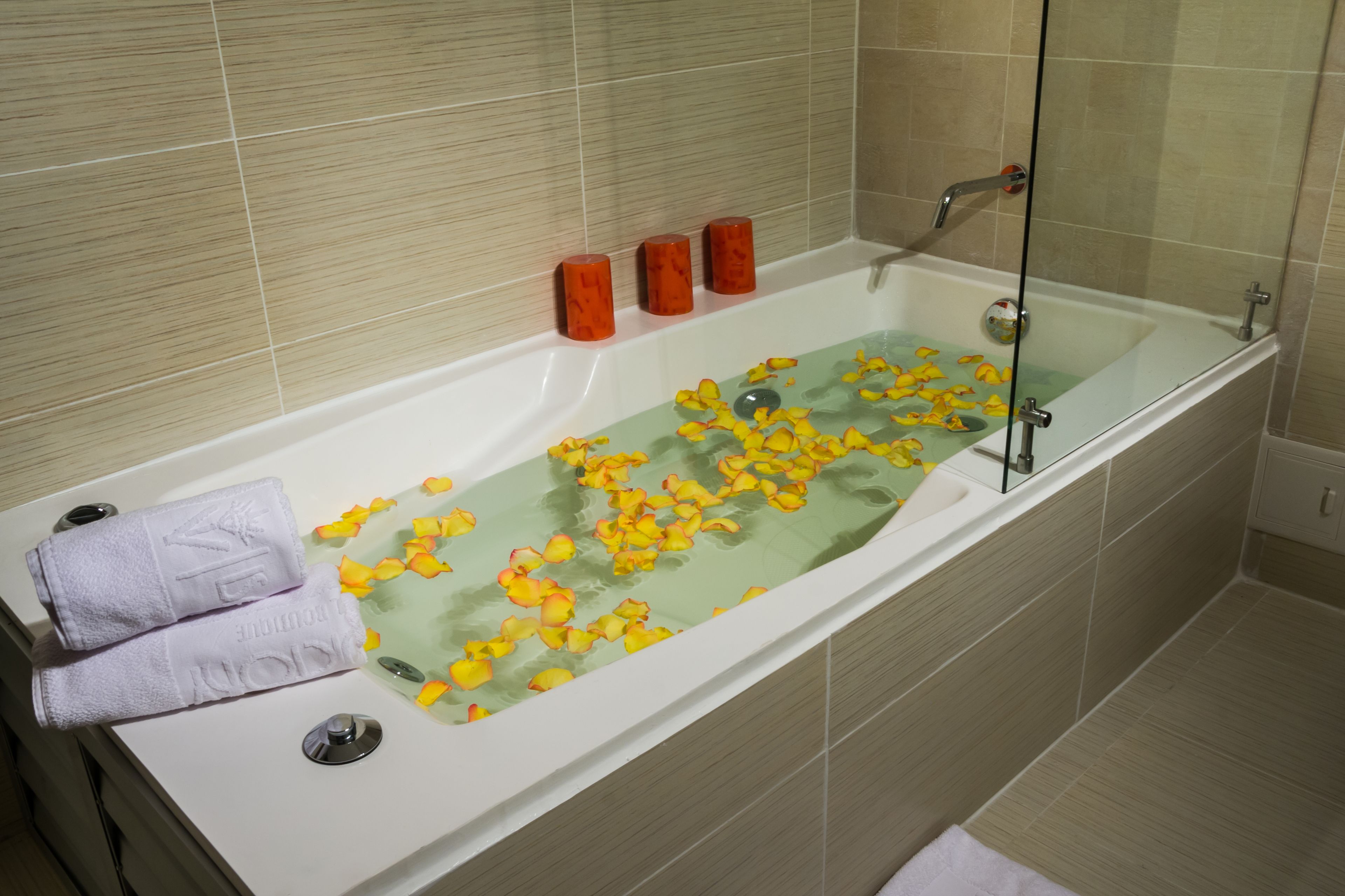 suite, 1 queen bed, balcony | bathroom | free toiletries, hair dryer, bathrobes, slippers