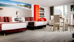 A modern hotel room with a bed, a desk, and a chair. There is a painting of a beach on the wall. - Isa Victory Hotel Boutique (Armenia)