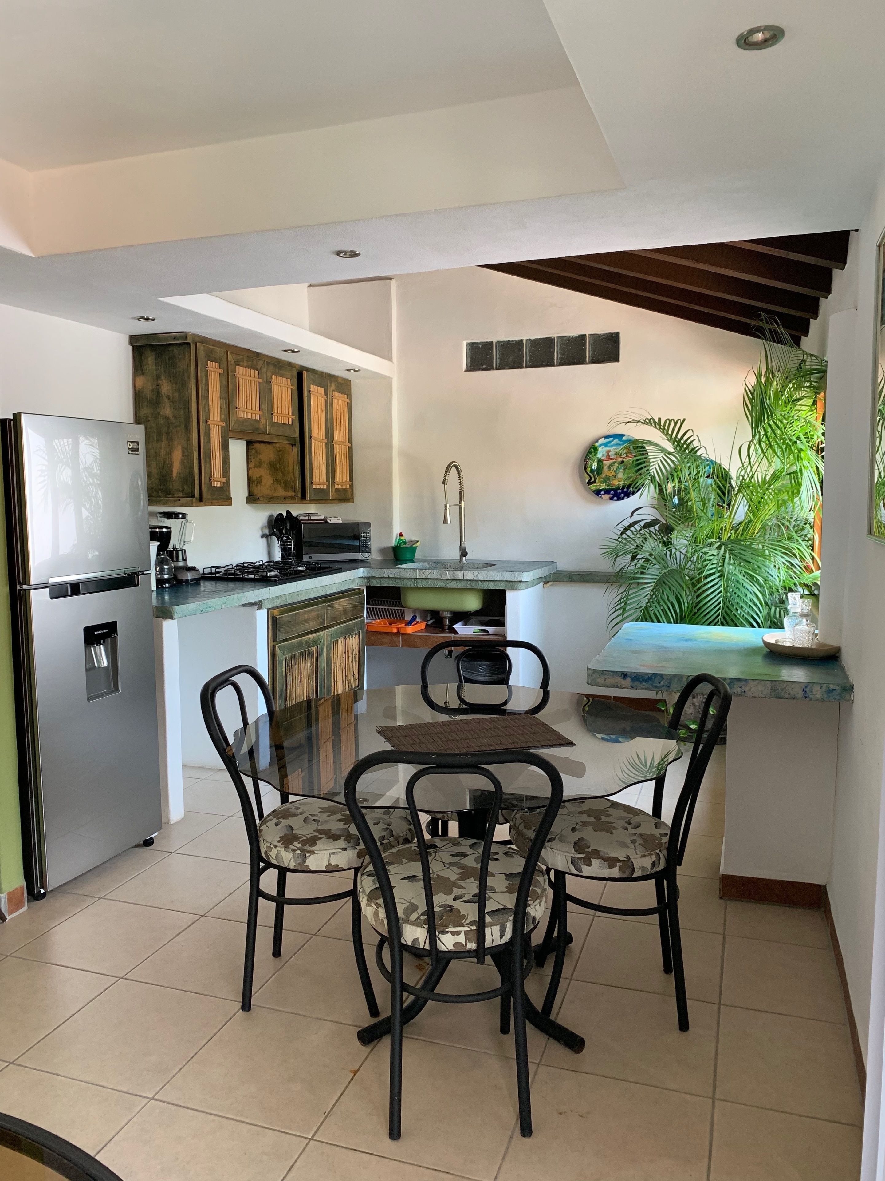 condo deluxe with kitchen | in-room dining