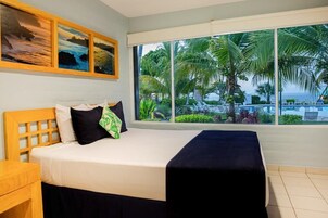 Family Room, Pool View | In-room safe, desk, free WiFi, bed sheets