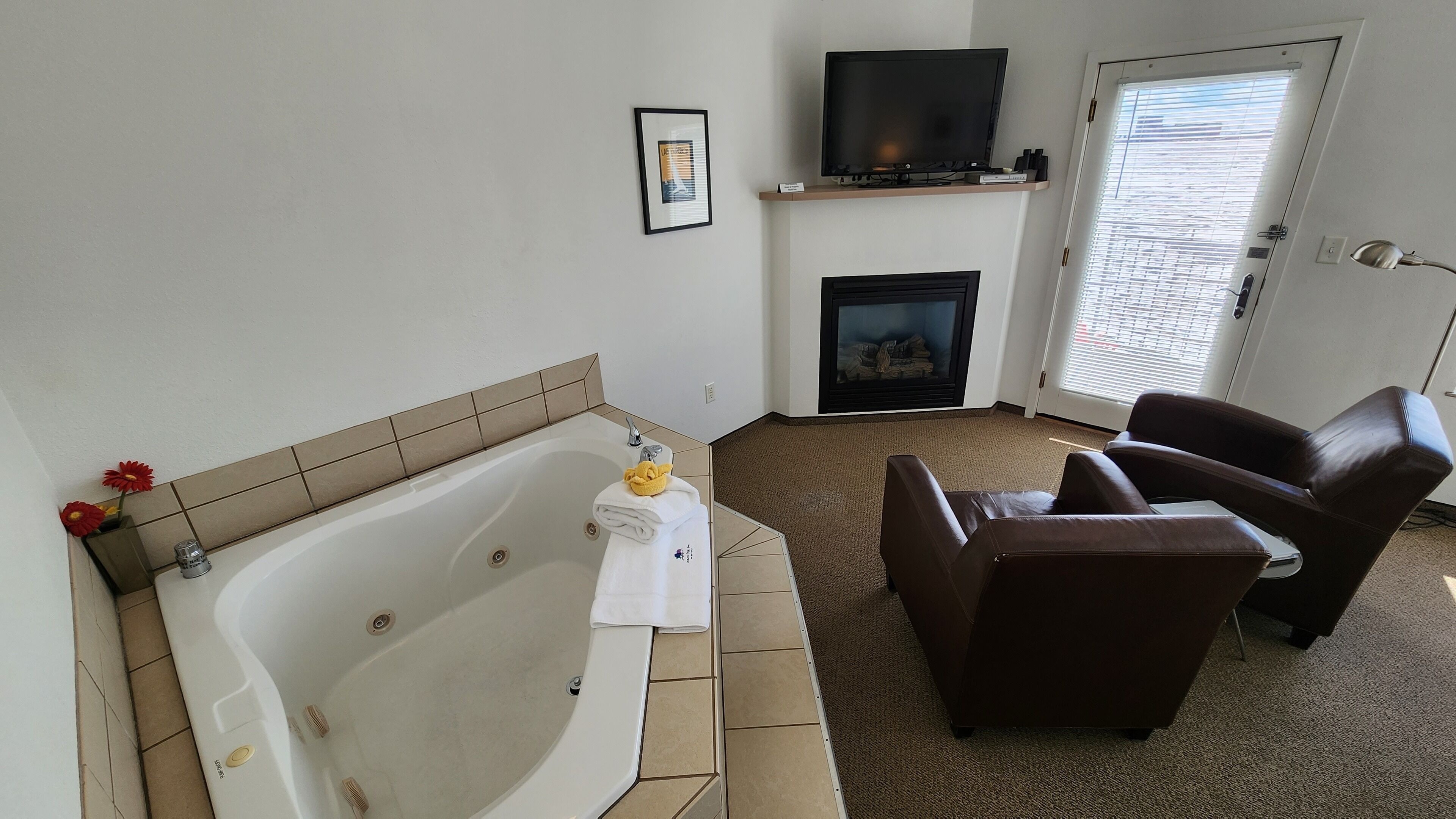 junior suite, 1 queen bed, hot tub, canal view | 1 bedroom, premium bedding, soundproofing, iron/ironing board