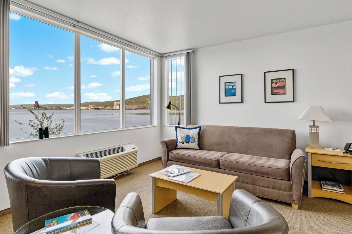Executive Suite, 1 King Bed with Sofa bed, Hot Tub, Bay View | Living area | Video library