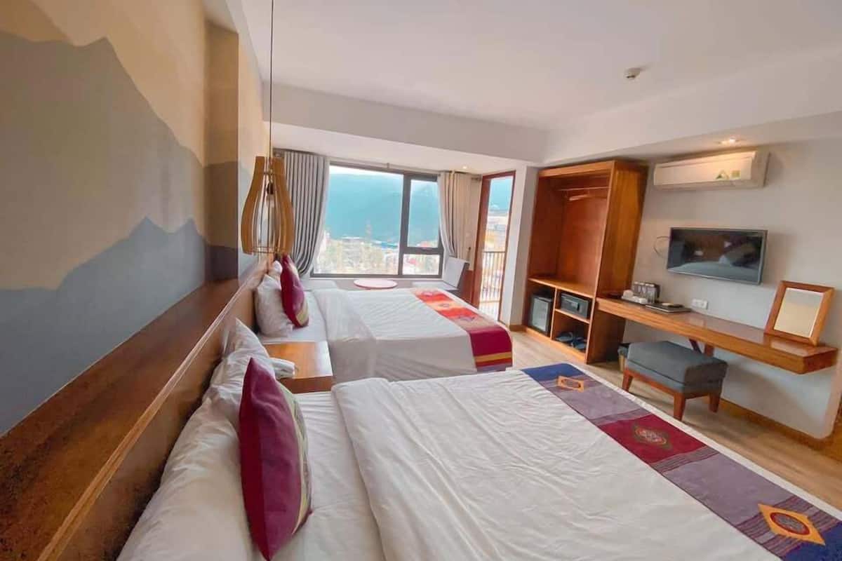 Familienzimmer | Minibar, Zimmersafe, Schreibtisch, kostenloses WLAN