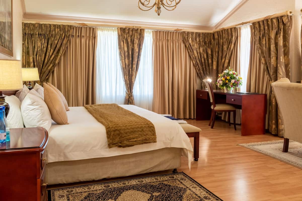 suite | premium bedding, tempur-pedic beds, blackout curtains, travel cot