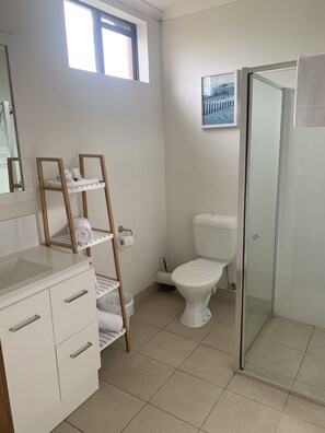 Shower, free toiletries, hair dryer, towels