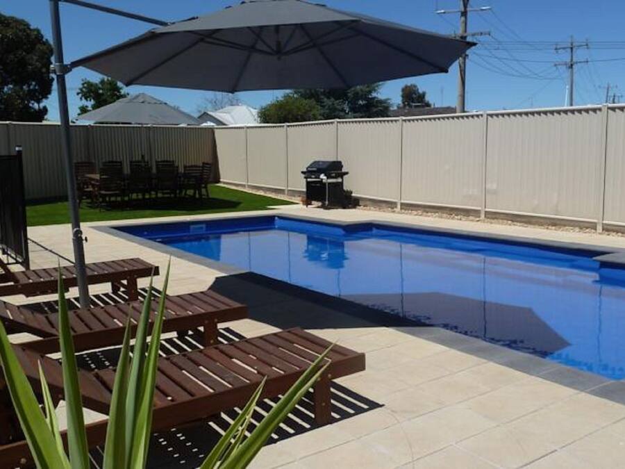 Outdoor pool, pool umbrellas, pool loungers