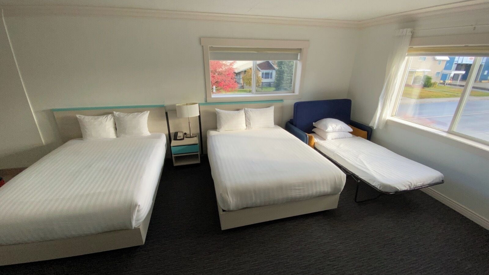 Deluxe Room, Multiple Beds | Desk, laptop workspace, blackout drapes, soundproofing