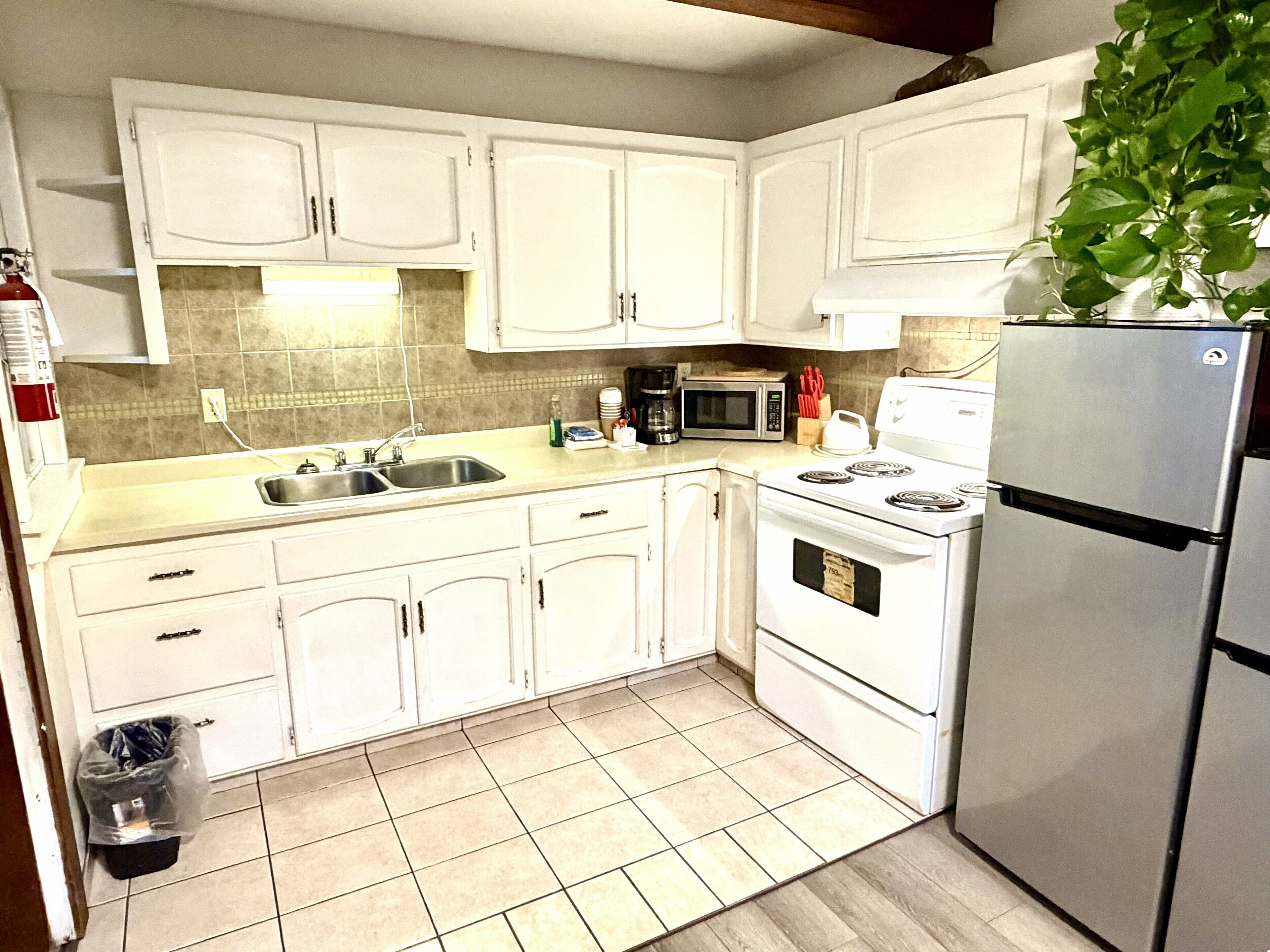 Grand Cottage | Private kitchen | Full-size fridge, microwave, coffee/tea maker