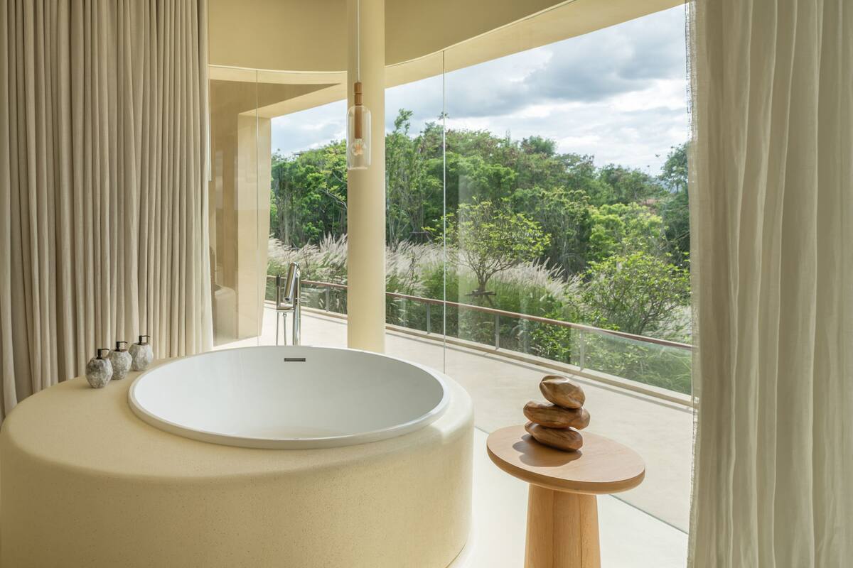 sala signature villa one | bathroom | separate bathtub and shower, rainfall showerhead, free toiletries