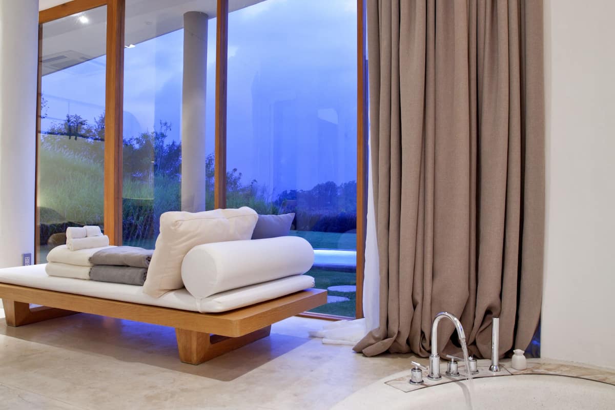 one bedroom pool villa suite | bathroom | separate bathtub and shower, rainfall showerhead, free toiletries