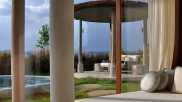 sala pool villa | Coin séjour | TV connectée, lecteur de DVD