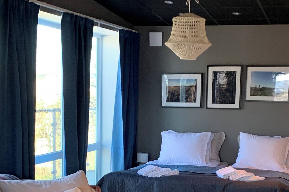 Family Quadruple Room | Laptop workspace, blackout drapes, free WiFi, bed sheets