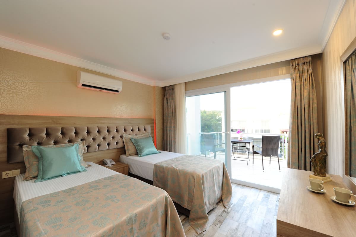 family suite | 1 bedroom, minibar, in-room safe, desk