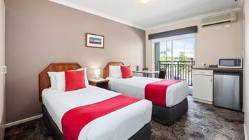 Standard Twin Room | Premium bedding, in-room safe, desk, iron/ironing board