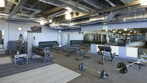A gym with weightlifting equipment, treadmills, and exercise machines. - Village Hotel Aberdeen (Aberdeen)