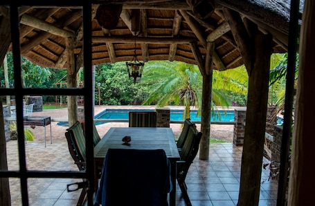 Family Room, Multiple Beds, Pool View | Exterior