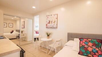 Junior Suite, Multiple Beds, Kitchenette | Minibar, iron/ironing board, free WiFi, bed sheets