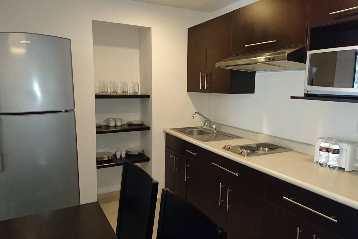 suite, 2 double beds | down duvets, in-room safe, individually furnished, desk