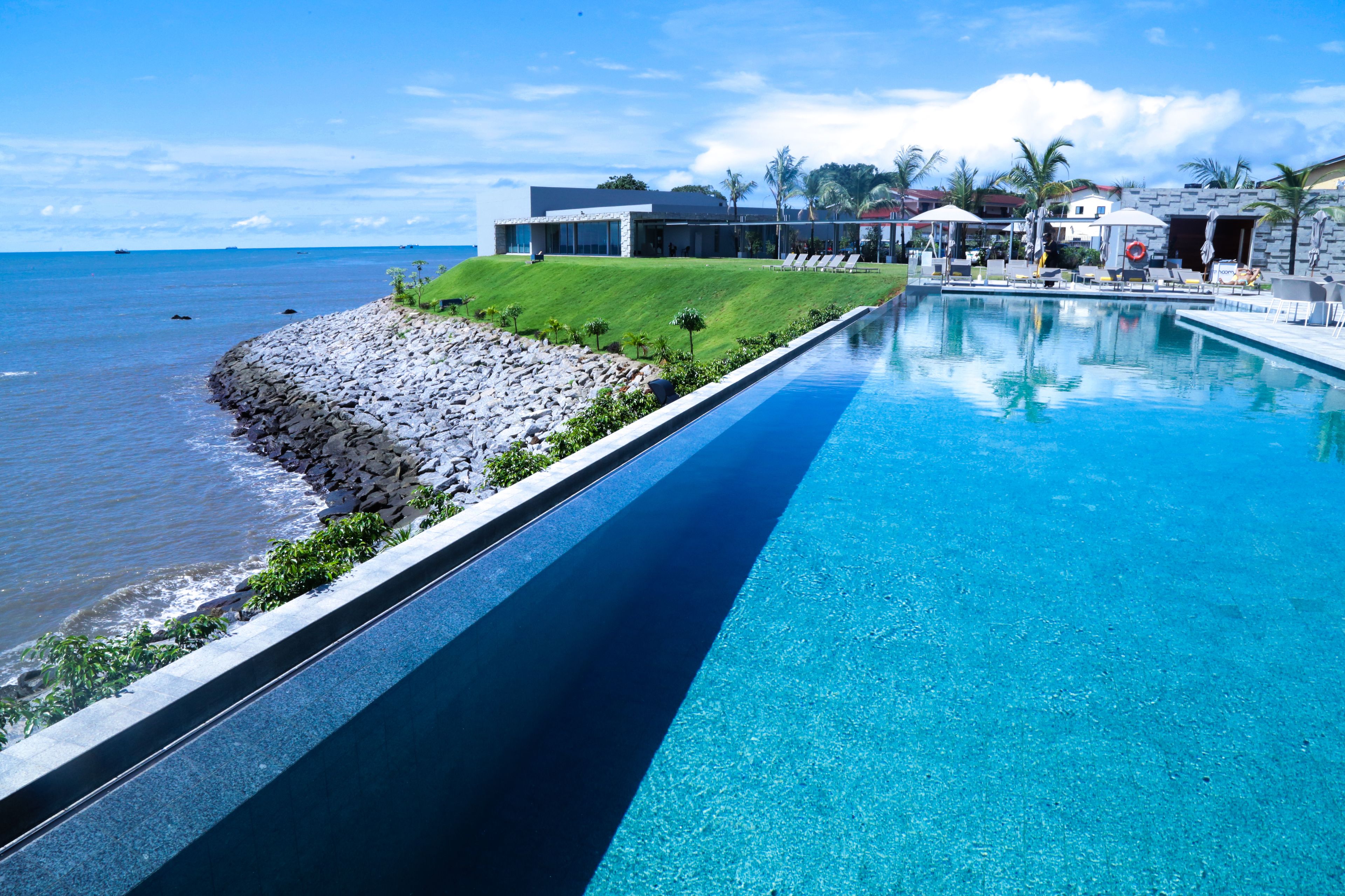 outdoor pool, pool umbrellas, pool loungers