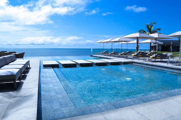 Outdoor pool, pool umbrellas, sun loungers