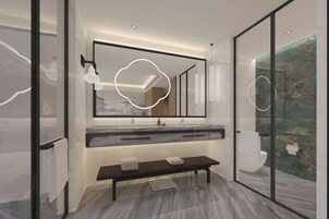 Minibar, caja de seguridad en la habitación y despertador 