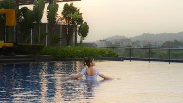 Outdoor pool, pool umbrellas, pool loungers