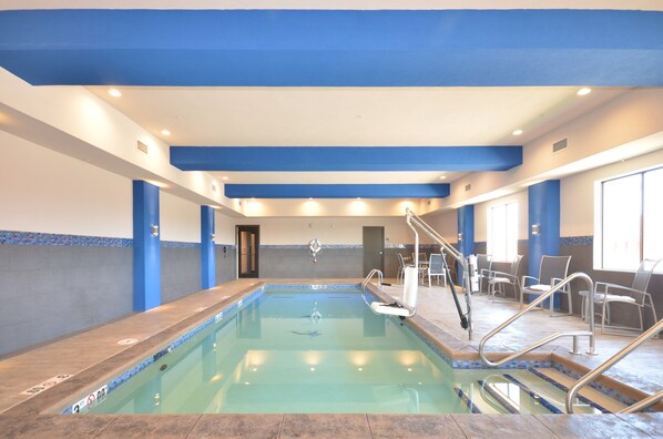 Indoor pool, open 6:00 AM to 10:00 PM, pool loungers
